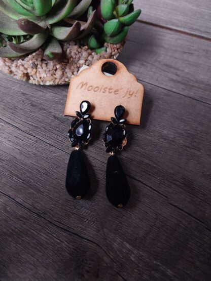Black stone with teardrop
